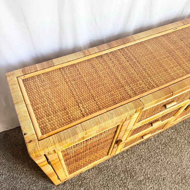 This boho chic wicker credenza captures the relaxed elegance of vintage coastal design. Crafted with a warm honey-toned...
