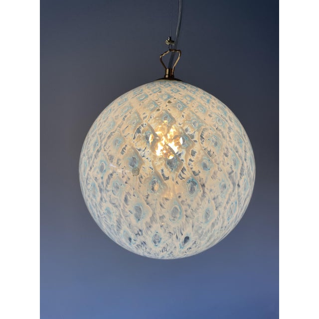 Macrame' sphere 25 by la murrina is a stunning vintage chandelier from the 1990s, featuring beautiful murano glass, mouth-...