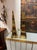 Pair of French Brass Obelisks. These pieces sit at the intersection of neoclassical French décor, 1970s Parisian glam, and...