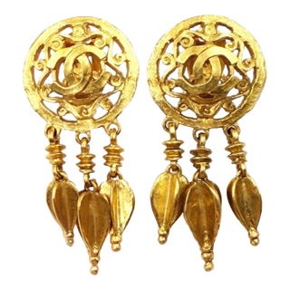 Chanel Vintage Gold Plated Round CC Filigree Spear Dangle Clip on Earrings, A Pair For Sale