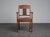 A refined pair of dutch amsterdam school art deco armchairs dating from the 1930s, characterized by their strong...