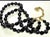 Mid century lava rock and black faux onyx, faceted glass, double strand, each strand is 16” in length. In a hook clasp....