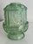 Vintage light green pressed glass fairy lamp, with Stars and Bars pattern. Has a scalloped footed base and patterned dome....
