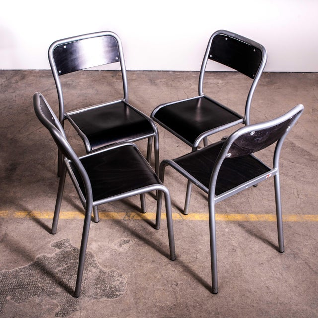 1970’s Black Mullca Stacking Dining Chairs – Set Of Four One of our most favourite chairs, in 1947 Robert Muller and...