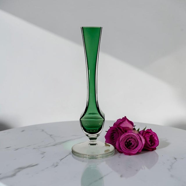 This Val Saint Lambert Soliflore vase was hand-blown in Belgium during the 1950s–1960s. Crafted in fine lead crystal, it...