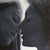 The Kiss #7 by Linda Delahaye | Oil on Panel Two faces close together in an intimate moment. For Sale