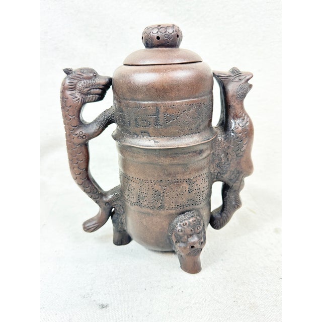 Lovely vintage replica of a Chinese antique incense holder. Made of metal and colored to look bronze. Detailed and signed...