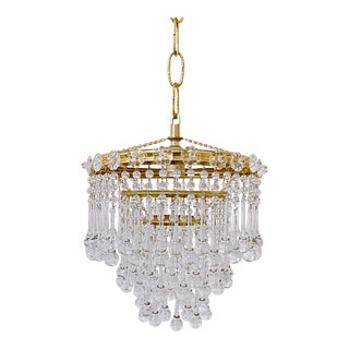 1950s Italian Brass and Crystal Rosettes Rim Upside Down Layered Cake Chandelier For Sale