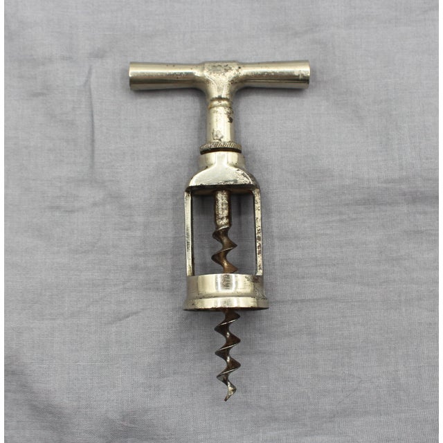Ballbearing corkscrew, early 20th century. Peters, pp. 101 and 102. Nickle on steel. 6" w., 2.82" d., 1.5" h.