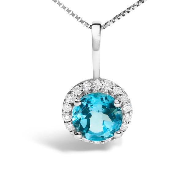 Adorn your neckline with the exquisite allure of this 10K white gold pendant necklace, where the warmth of the metal...