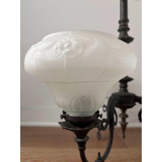 American Circa 1925–1935 Tudor Revival / Spanish Revival Original cast iron body Original satin etched glass shades Three-...