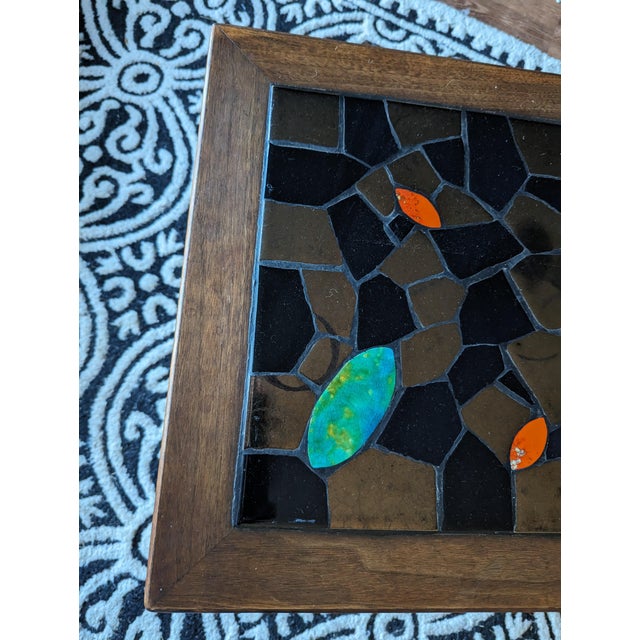 Absolutely stunning piece of mid-century. One of a kind. Curved legs. Various shapes and sizes of metallic copper and...