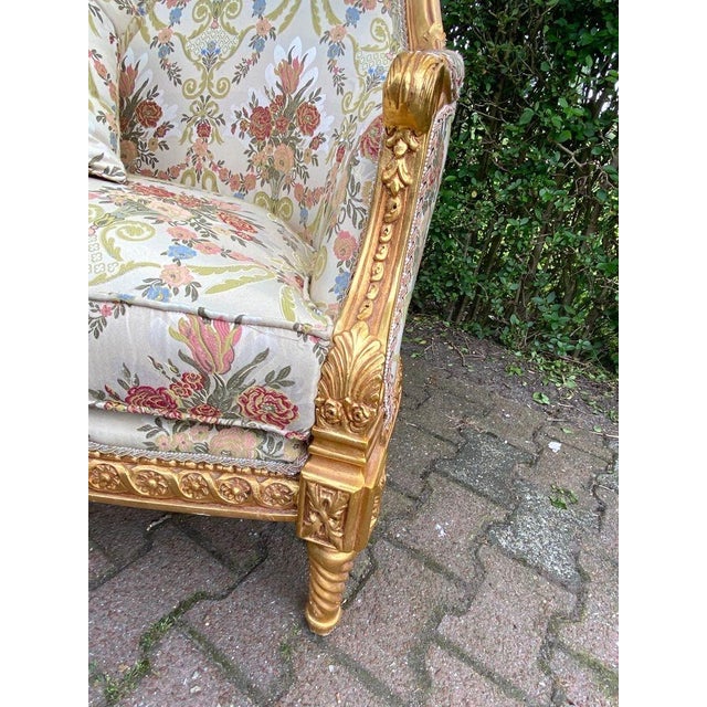Late 20th Century French Louis XVI Gilded Beech Settee This refined Late 20th Century French Louis XVI–style settee is an...
