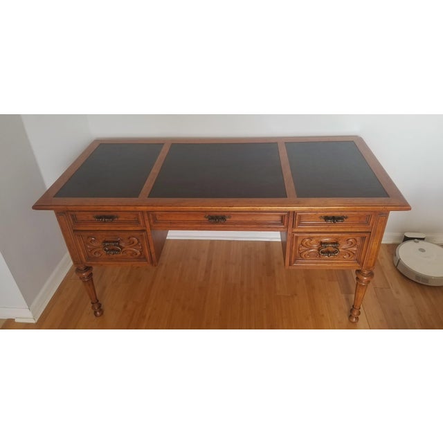 A stately and substantial vintage executive desk suite by renowned American furniture maker Drexel. This solid wood desk...