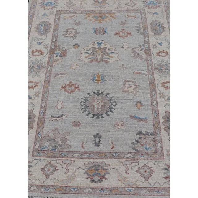 Modern Floral Modern Oushak With Muted Gray Background and Cream Border For Sale - Image 3 of 13
