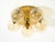 Beautiful mid-century brass ceiling light with six gold-colored glass globes. the glass globes feature a pattern of...