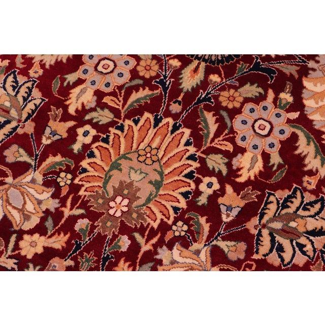 Designed with mesmerizing intricacy and gorgeous color palette, this hand-knotted masterpiece demonstrates the beauty and...