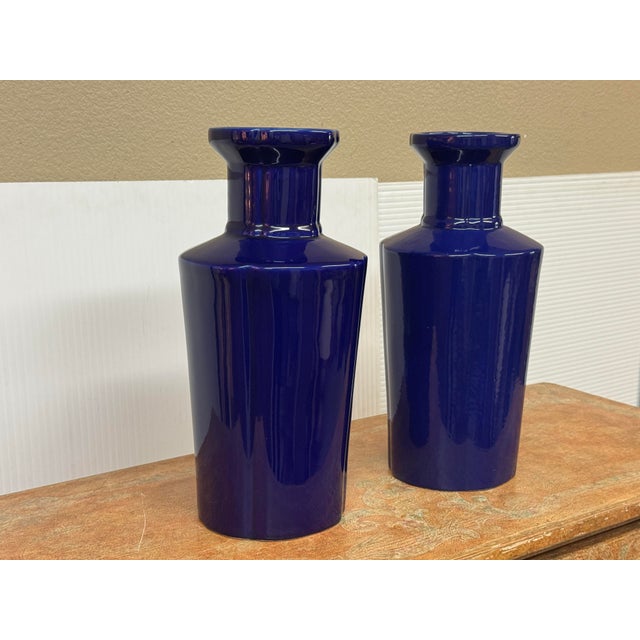 Design Plus Gallery presents a pair of Glazed Ceramic Bottle Vases from Martino Interiors. Each vase has an elongated...