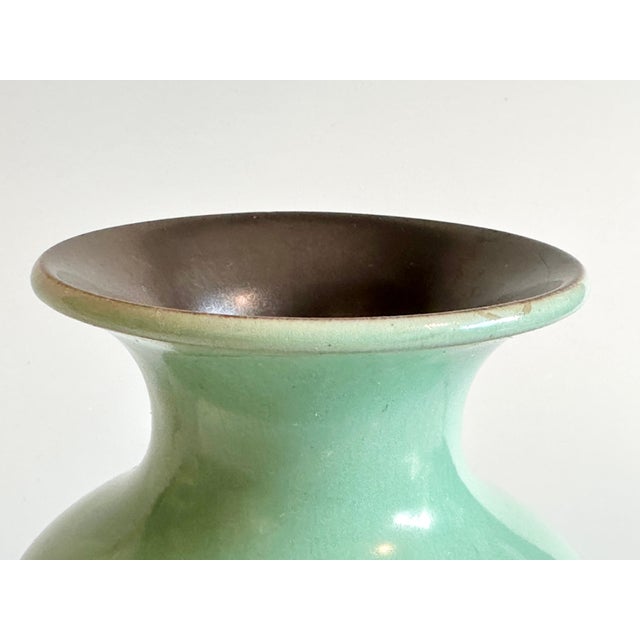An elegant ceramic cabinet vase from Steuler, crafted during the heyday of German Mid-Century Design around 1960. The...
