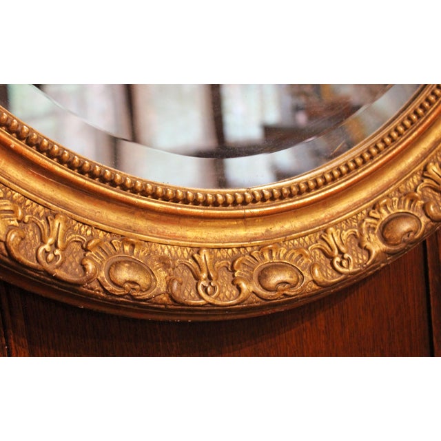 Circa 1860-80 French Grand Oval Carved Giltwood Mirror For Sale - Image 4 of 5