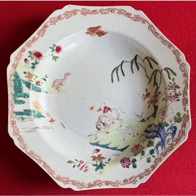 Antique 18th century Chinese export porcelain octagonal plate with deep well. Decorated with a landscape scene of a boy...