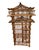 A striking vintage pagoda-style bamboo etagere showcasing sculptural architectural lines inspired by traditional Asian...