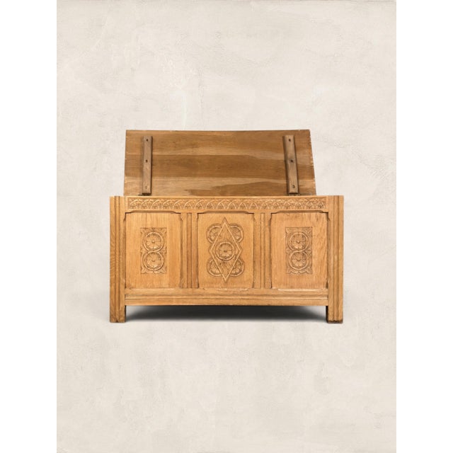 A handsome vintage English oak blanket chest, also known as a coffer, dating to circa 1970. Crafted from oak with a warm...