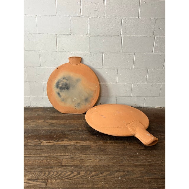 Unique terracotta clay form decorative vases. Large in scale. Perfect post-modern, southwestern decor. One has a flat bottom.