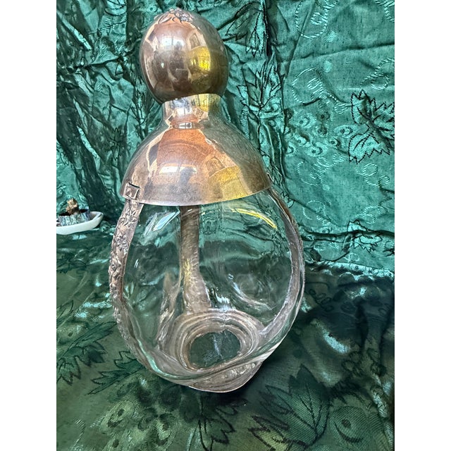 1930's Sterling Silver Beautifully Etched Decanter. It can be used for wine or hard alcohol.