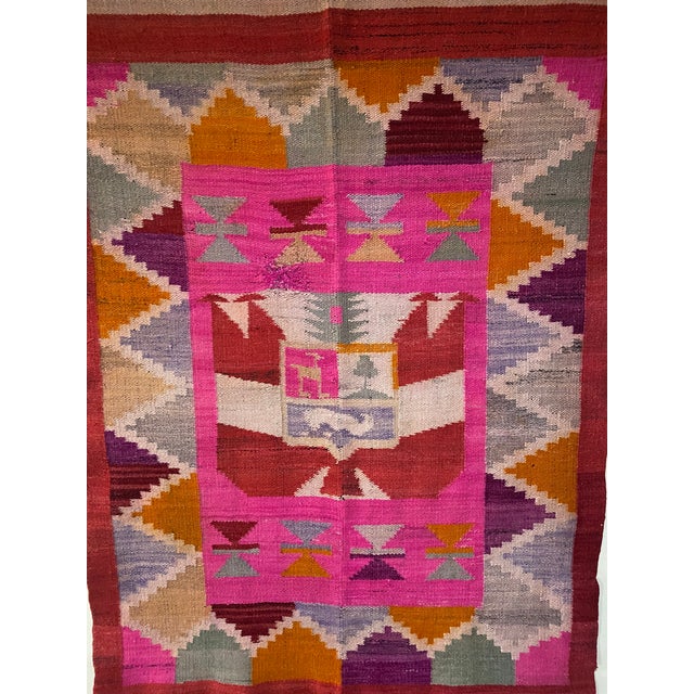 Vintage handwoven Peruvian folk art textile likely woven in the late 20th century featuring the national coat of arms...