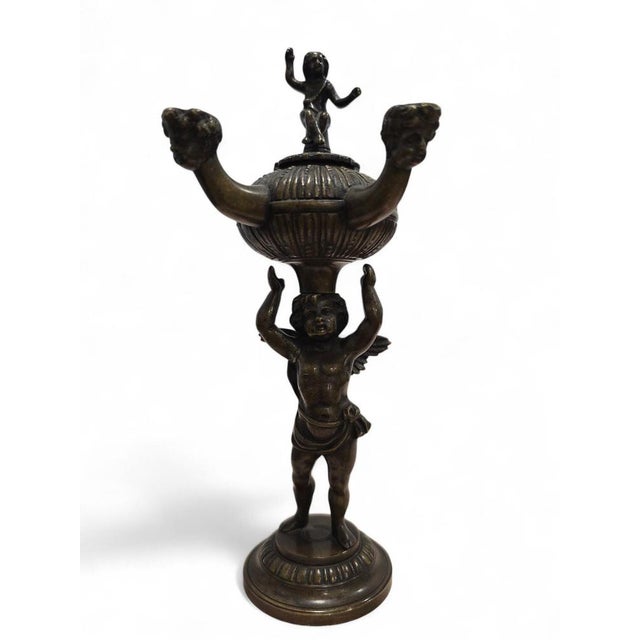 Elegant 19th-century bronze incense burner, inspired by the ceremonial vessels of Ancient Rome. Finely cast and richly...