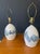 Hand painted ceramic table lamps with a free flowing organic design. Signed but the signature is unknown.
