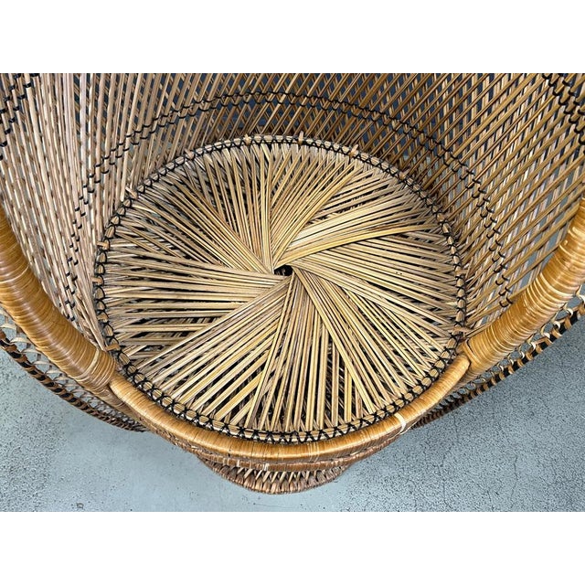 Elegant vintage peacock 'emanuelle' style chair. Timeless and decorative pieces in the bohemian style. Can be used both...