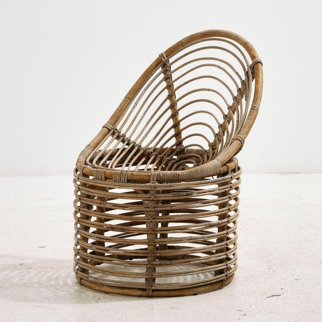 Rattan and bamboo set from the 1970s. The set consists of one chair and one table. It is the perfect choice for both...