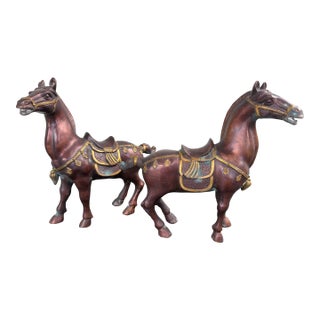 Vintage Pair of Patinated Bronze Horse Sculptures With Gilt Accents For Sale