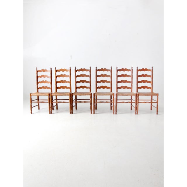 This set of six vintage Tell City Chair Company chairs dates from circa 1924 to 1943. Featuring tall ladder-back frames...