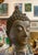This antique bronze Buddha head bust is a serene and timeless example of Buddhist art. Standing 8.5 inches tall, it...