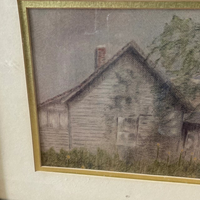 A very nice charcoal drawing of a weathered house. Solid wood frame with cream & gold matting. No artist signature.