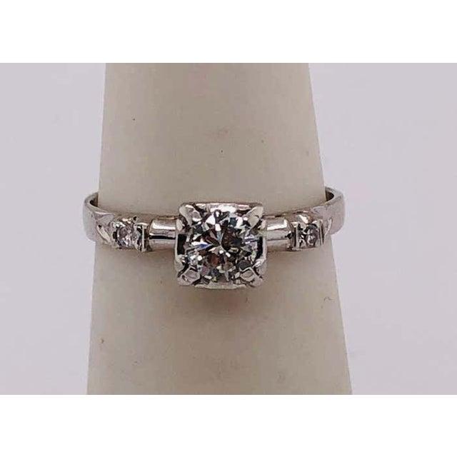 14 Karat White Gold Diamond Engagement Ring 0.60 Total Diamond Weight. Size 4.75 with 1.95 grams total weight.