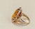 Approximately 32 Carat Natural Oval Citrine Cocktail Ring in 14 Karat Yellow Gold, Estate This is a ring which has a...