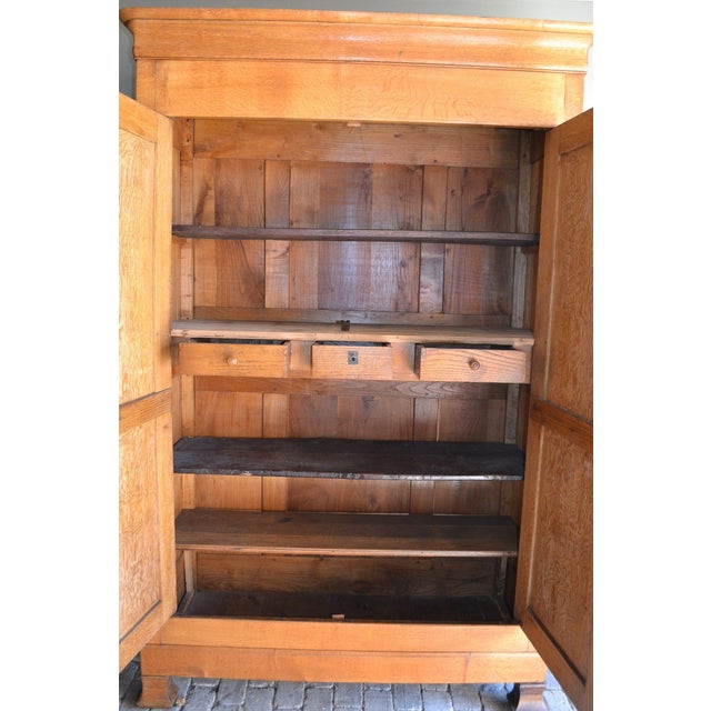 19th-century French oak Louis Philippe cabinet. The height is 227 cm. The width is 145 cm. The depth is 59 cm. Fully...