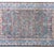 A stunning and rare early 20th century Persian Kirman rug with the most elaborately woven pattern with myriad swirling...