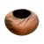 A terracotta pot with minimal elegant detailing. Fired clay with wave-like ripples at the mouth rim. Variance in color...