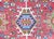 A charming early 20th century Persian petite hand knotted Heriz rug with three large stylized floral medallions living...