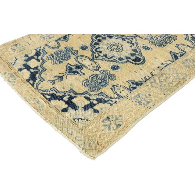 vintage Turkish Oushak rug Warm Mediterranean Coastal style. Effortless beauty and simplicity meet warm beiges and deep...