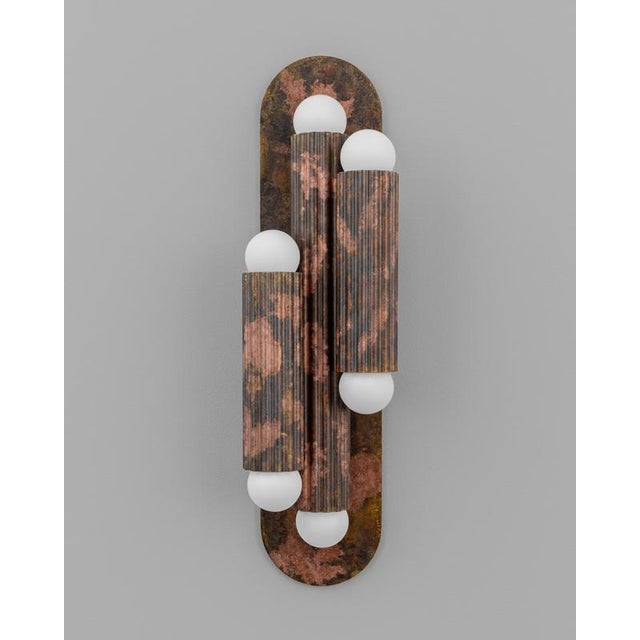 Vesta triple ii wall sconce by schwung dimensions: ø 12,6 x h 45,6 cm materials: triplex opax transparent glass, lacquered...