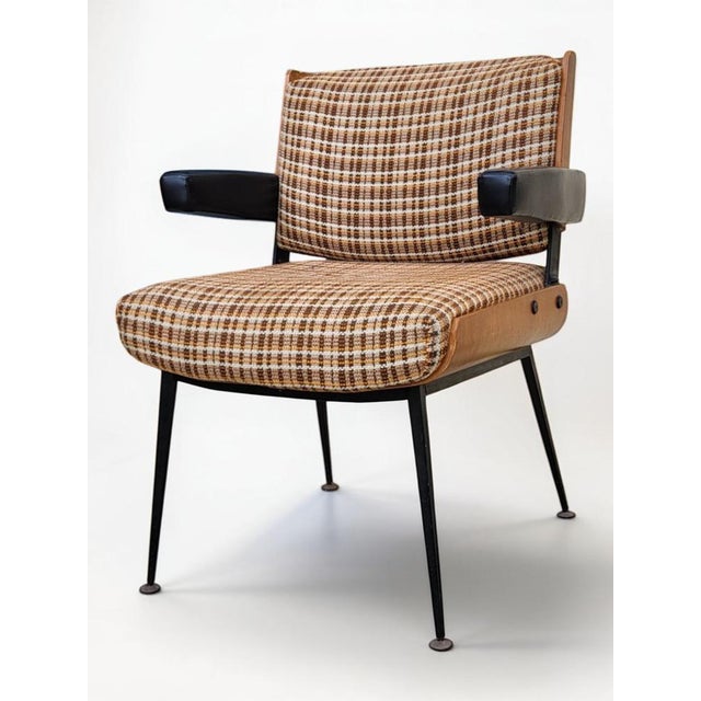 Marcom 704 armchair from the Modern' Tube series, circa 1960s. Attributed to Alain Richard. Thermoformed wood frame, thick...
