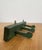 Bring authentic vintage charm and practical style to your home with this Antique Rustic Wooden Peg Hook Strip in Green....