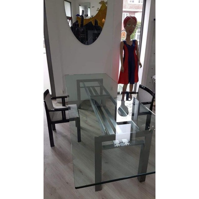 Timeless classic dining table Doge by Carlo Scarpa, solid brushed steel base connected with brass socket screws and a...