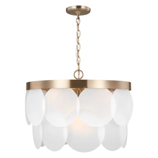 The Mellita six light indoor pendant in satin brass enhances the beauty of your home with ample light and style to match...